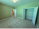 Bedroom with carpet, walk-in closet, and two doorways at 2895 Brandl Cove Ct # 4, Marietta, GA 30067