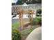 Community landscaping with a wooden swing at 2895 Brandl Cove Ct # 4, Marietta, GA 30067