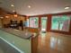 Bright kitchen with wood floors, stainless appliances, island, and a door to the deck at 2895 Brandl Cove Ct # 4, Marietta, GA 30067