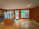 Kitchen features stainless appliances, wood floors, island, and a door to the deck at 2895 Brandl Cove Ct # 4, Marietta, GA 30067