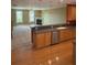 Open concept living space with a fireplace and updated kitchen at 2895 Brandl Cove Ct # 4, Marietta, GA 30067