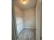 An empty walk-in closet featuring metal racks for clothing and storage at 2895 Brandl Cove Ct # 4, Marietta, GA 30067