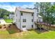 Exterior of home showcasing backyard with large deck, lawn and walkout basement, blending indoor and outdoor living at 510 Black Horse Cir, Canton, GA 30114
