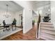 Spacious foyer showcasing hardwood floors, leading to an office, stairs to upper level and living area at 510 Black Horse Cir, Canton, GA 30114