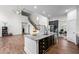 Spacious kitchen with granite island, stainless steel appliances, and dark wood cabinets at 510 Black Horse Cir, Canton, GA 30114