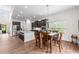 Bright and airy kitchen featuring granite countertops, stainless steel appliances, and adjacent dining at 510 Black Horse Cir, Canton, GA 30114