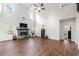 Spacious living room featuring a stone fireplace, large windows, and soaring ceilings at 510 Black Horse Cir, Canton, GA 30114