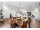 Open concept with living room and kitchen featuring hardwood floors and cathedral ceilings at 510 Black Horse Cir, Canton, GA 30114