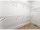 Spacious walk-in closet featuring a carpeted floor and white wire shelving at 510 Black Horse Cir, Canton, GA 30114