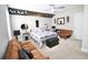 Stylized bedroom with a ceiling fan and unique design elements, creating a cozy and inviting atmosphere at 605 Oak Ln, Canton, GA 30114