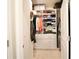 Well-organized walk-in closet with built-in shelving, drawers, and ample storage space at 605 Oak Ln, Canton, GA 30114