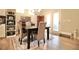 Cozy dining area with wood floors and ample natural light at 605 Oak Ln, Canton, GA 30114