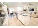 Open concept kitchen, dining and living room area with modern finishes at 605 Oak Ln, Canton, GA 30114