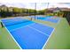 Bright and clean tennis courts provide space for friendly competition and exercise at 605 Oak Ln, Canton, GA 30114