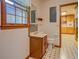 Bathroom with tiled floor, wooden vanity with sink, and window at 1830 Francis Sw Rd, Conyers, GA 30094