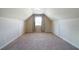 Carpeted empty bedroom with neutral walls, window and lots of potential at 303 Horizon Trce, Loganville, GA 30052