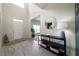 Spacious foyer with high ceilings, stylish decor, and wood-look flooring at 303 Horizon Trce, Loganville, GA 30052