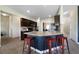 Stylish kitchen with stainless steel appliances, granite countertops, and dark wood cabinetry at 303 Horizon Trce, Loganville, GA 30052