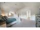 Spacious main bedroom featuring ample natural light, and adjacent bathroom at 303 Horizon Trce, Loganville, GA 30052