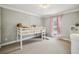 Inviting ' bedroom with stylish decor, fun furnishings, and a comfortable space for play and relaxation at 4624 Stonehenge Dr, Atlanta, GA 30360