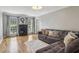 Comfortable living room featuring hardwood floors, a neutral color scheme, and a large sectional sofa at 4624 Stonehenge Dr, Atlanta, GA 30360