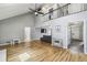 Open living area with high ceilings and hardwood flooring throughout at 4624 Stonehenge Dr, Atlanta, GA 30360