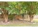 Cozy backyard swing is nestled between mature trees offering a private retreat at 5286 Wild Indigo Nw Way, Acworth, GA 30102