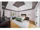 Comfortable bedroom with a tray ceiling, large window, and neutral décor for a relaxing atmosphere at 5286 Wild Indigo Nw Way, Acworth, GA 30102