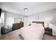 Comfortable bedroom with neutral walls and plush carpet, natural light and furniture at 5286 Wild Indigo Nw Way, Acworth, GA 30102