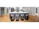 Stylish kitchen with large center island featuring seating, stainless appliances, and lots of cabinets at 5286 Wild Indigo Nw Way, Acworth, GA 30102