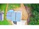 Overhead view of the house showcasing the roof and partially fenced backyard at 6050 Randy Ln, Ellenwood, GA 30294