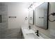 Bathroom featuring double sinks and modern lighting at 6050 Randy Ln, Ellenwood, GA 30294