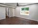 Bedroom featuring new windows, recessed lights and dark wood floors at 6050 Randy Ln, Ellenwood, GA 30294