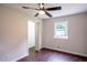 Lovely bedroom with hardwood floors, ceiling fan, and walk-in closet at 6050 Randy Ln, Ellenwood, GA 30294
