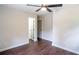 Bright and airy bedroom with hardwood floors, ceiling fan, and neutral walls at 6050 Randy Ln, Ellenwood, GA 30294