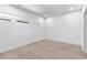 A bright bedroom with hardwood floors and neutral walls at 108 Park Pl # 110, Decatur, GA 30030