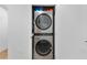 In unit stainless steel stacked washer and dryer inside of closet at 108 Park Pl # 110, Decatur, GA 30030