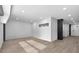 Bright, open living room featuring hardwood floors and recessed lighting at 108 Park Pl # 110, Decatur, GA 30030