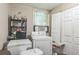 Laundry room with washer, dryer, and additional storage space at 1454 Beecher Sw St, Atlanta, GA 30310