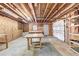 Unfinished basement offers ample storage and workspace with convenient access to the garage at 2324 Blackberry Ct, Snellville, GA 30078