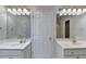 Large bathroom with dual vanities, mirrors, and great lighting, providing ample space at 2324 Blackberry Ct, Snellville, GA 30078