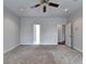 Large bedroom with plush carpet, neutral walls, and ample space for relaxation and decor at 2324 Blackberry Ct, Snellville, GA 30078