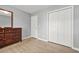 Bedroom featuring a closet and a chest of drawers at 30 Creek Bottom Dr, Covington, GA 30014