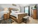 Comfortable main bedroom with a large bed, neutral colors, and natural light at 30 Creek Bottom Dr, Covington, GA 30014