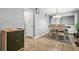 Dining area features a modern table with chairs, located next to the kitchen at 30 Creek Bottom Dr, Covington, GA 30014