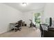 Bright bedroom space for office and exercise with natural light and neutral carpet at 3301 Henderson Mill Rd # Aa3, Atlanta, GA 30341