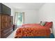 Cozy bedroom boasts natural light, a large dresser, and plush carpet, perfect for comfort and relaxation at 3301 Henderson Mill Rd # Aa3, Atlanta, GA 30341