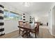 Dining area with a large window that offers plenty of natural light, with an open-concept feel at 3301 Henderson Mill Rd # Aa3, Atlanta, GA 30341