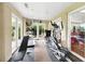 A fully-equipped gym space with treadmill, elliptical, and weight machines bathed in natural light at 3301 Henderson Mill Rd # Aa3, Atlanta, GA 30341
