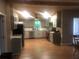 Modern kitchen with stainless steel appliances, light gray cabinets, and a subway tile backsplash at 4744 Chickasaw Se Way, Acworth, GA 30102
